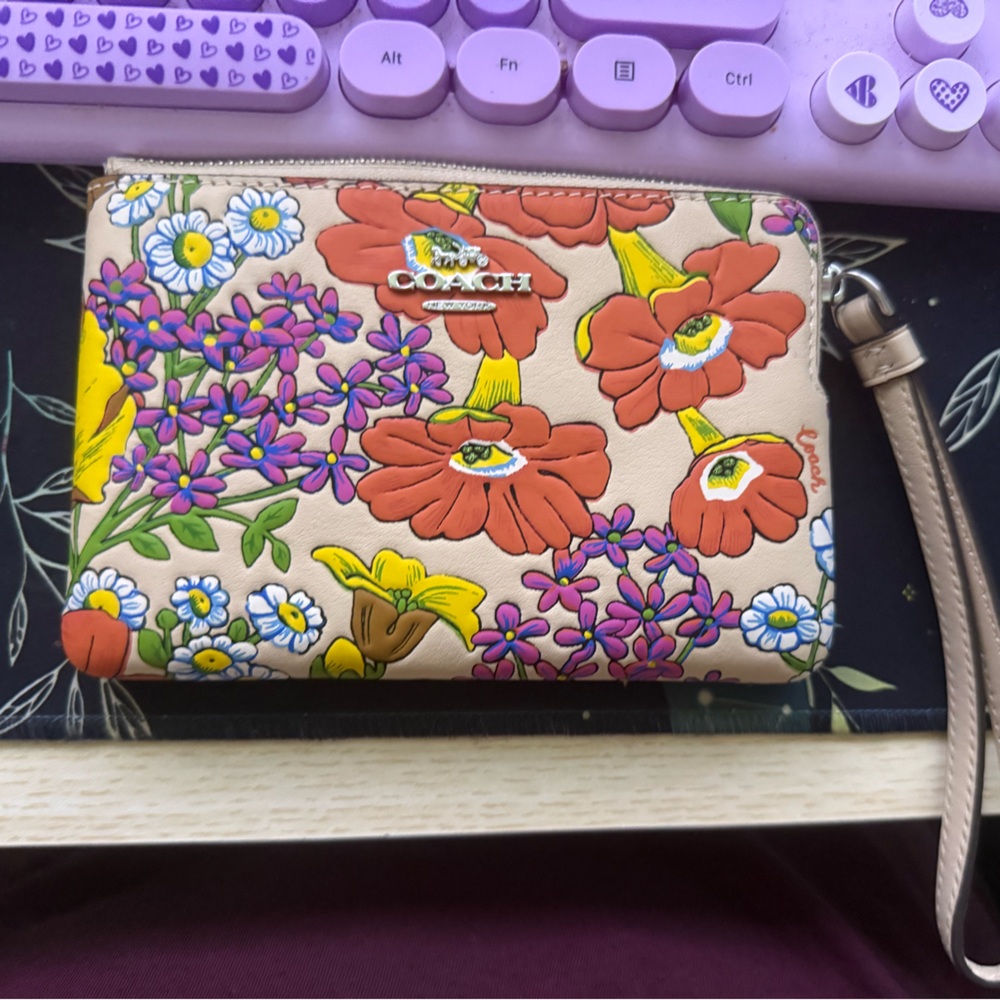 Coach Corner Zip Wristlet in floral print